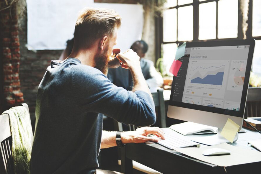 guy looking at sales chart