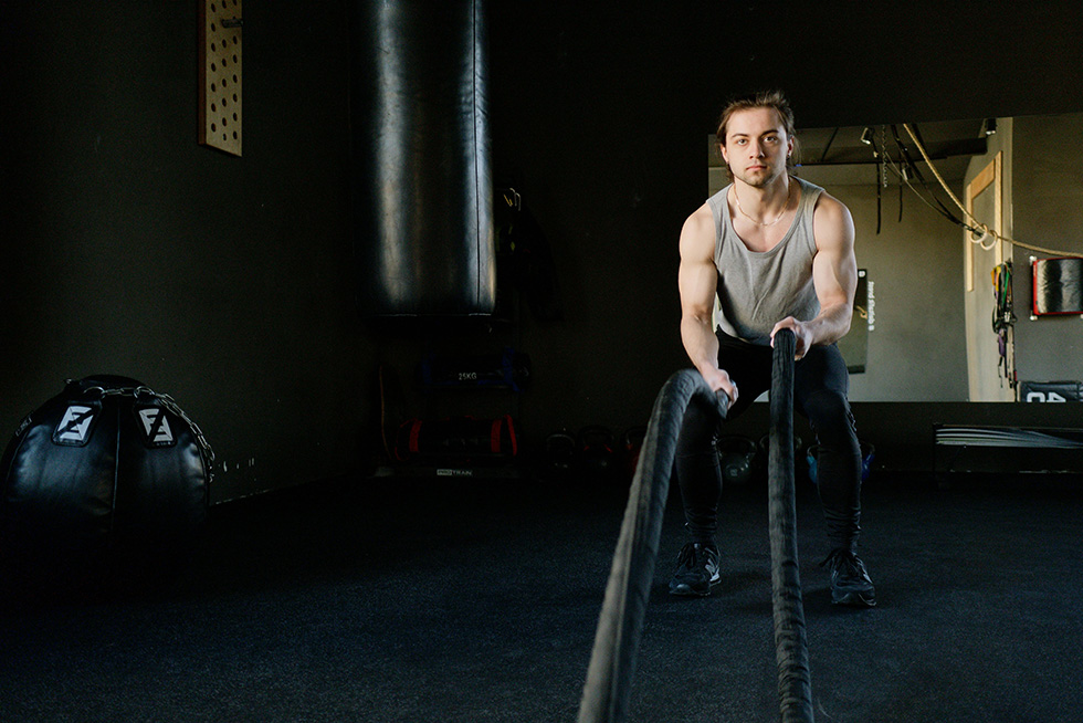 guy working out with rope