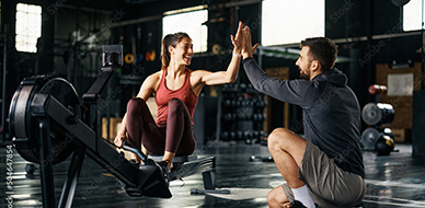 gym members high fiving