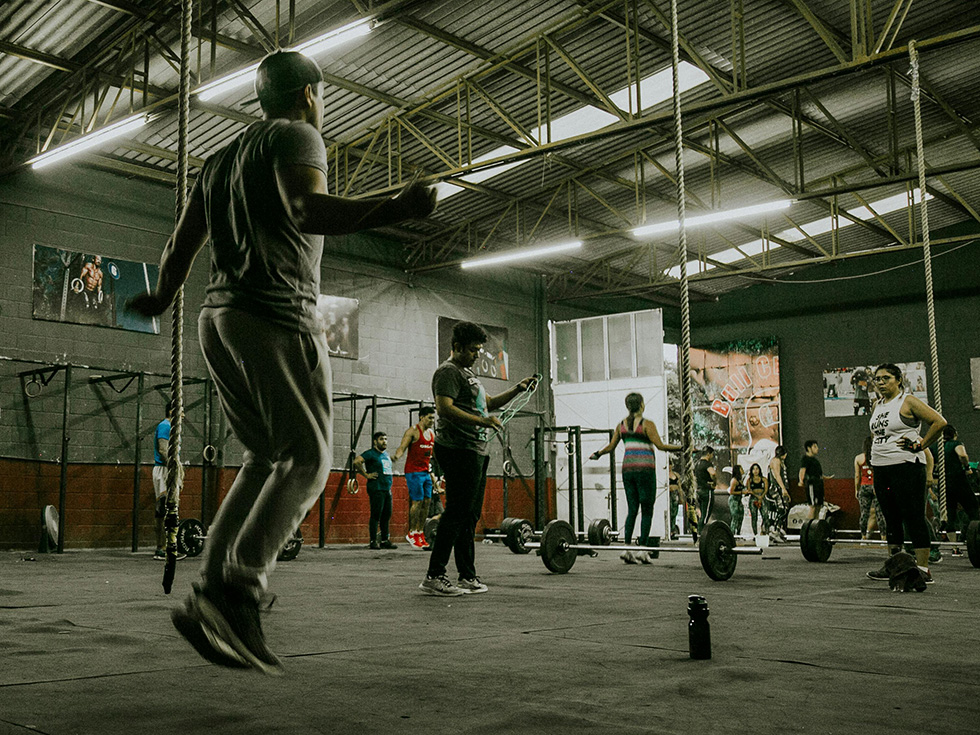 man jumping rope in gym