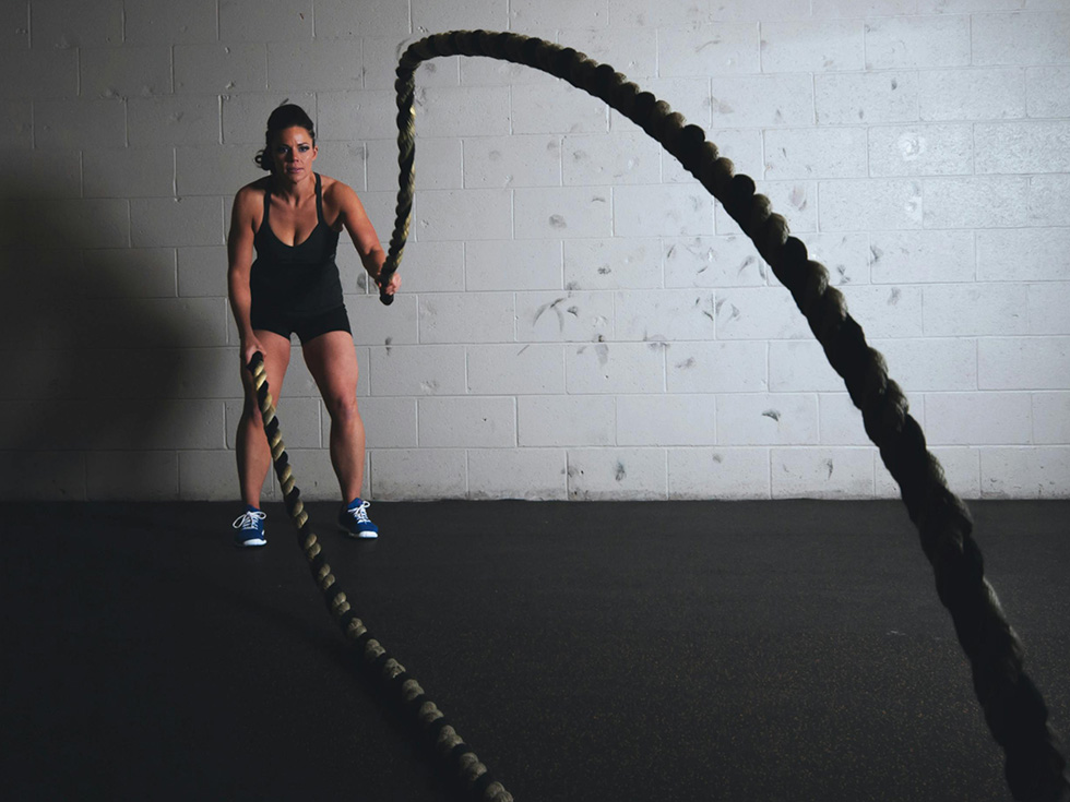 woman exercising with rope